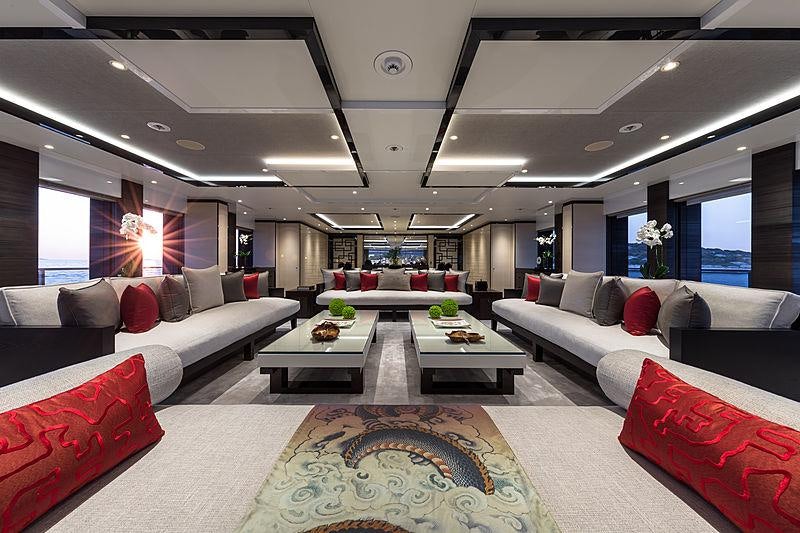 a living room with a couch and a table aboard SAMURAI Yacht for Charter