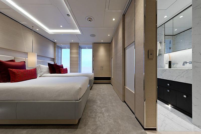 a bedroom with a bed and a desk aboard SAMURAI Yacht for Charter