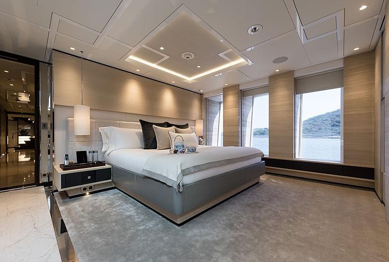 a large bedroom with a large bed aboard SAMURAI Yacht for Charter