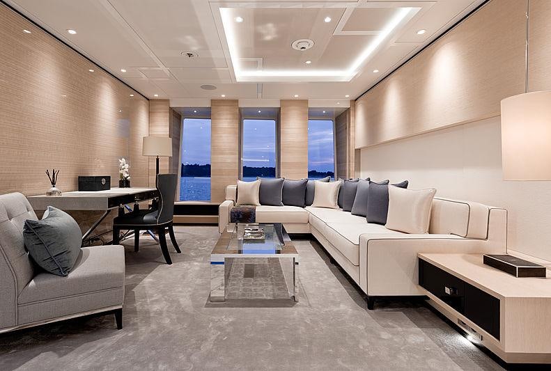 a living room with a couch and a coffee table aboard SAMURAI Yacht for Charter