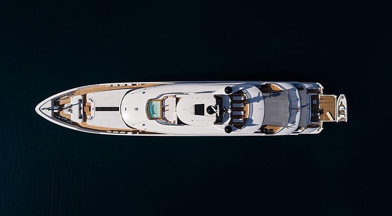 a silver and gold object with a black background aboard SAMURAI Yacht for Charter