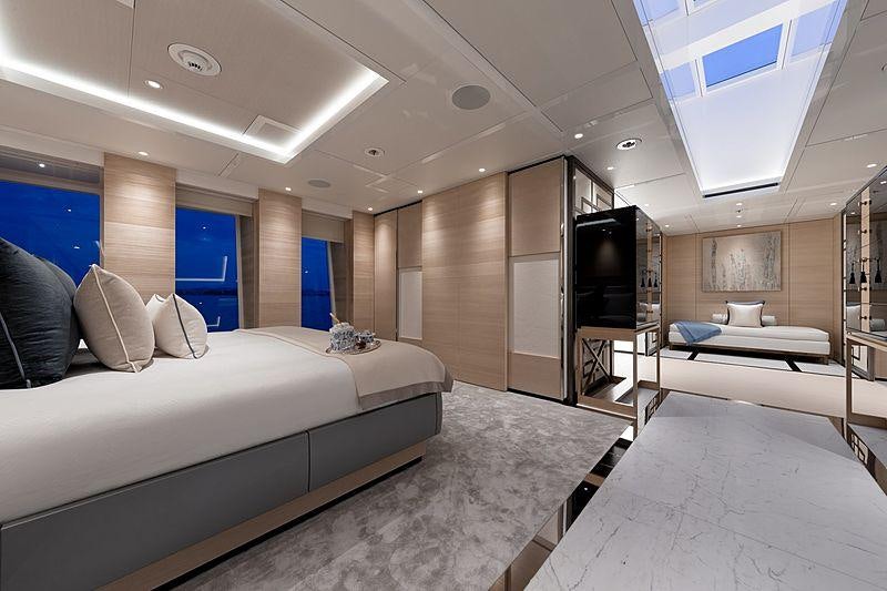 a room with a bed and a tv aboard SAMURAI Yacht for Charter