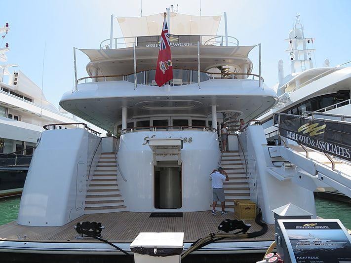 a large ship docked aboard BELLA VITA Yacht for Charter