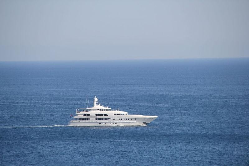 a white boat in the water aboard BELLA VITA Yacht for Charter