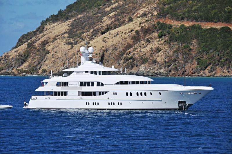 a white boat on the water aboard BELLA VITA Yacht for Charter