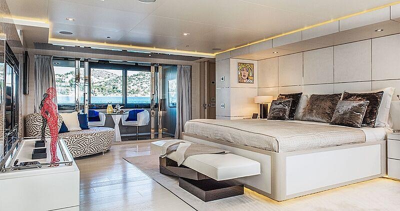a living room with a large window aboard LIGHT HOLIC Yacht for Charter