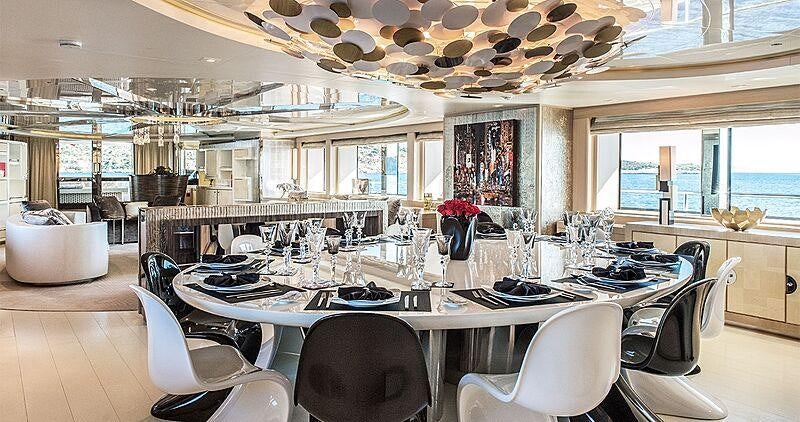 a large kitchen with a large table aboard LIGHT HOLIC Yacht for Charter