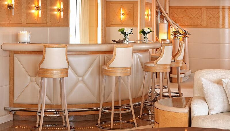 a room with a table and chairs aboard CAPRI I Yacht for Charter