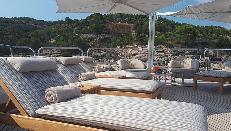 a bed on a deck aboard CAPRI I Yacht for Charter