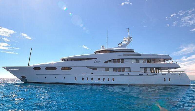 a large white yacht aboard CAPRI I Yacht for Charter