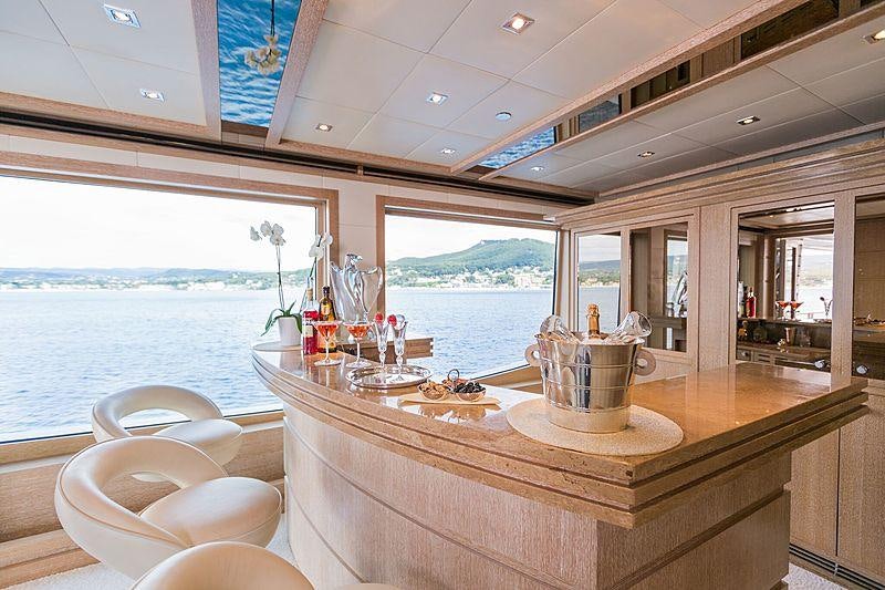 a kitchen with a view of the ocean aboard FRIENDSHIP Yacht for Charter