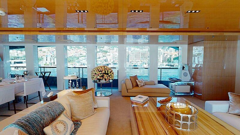 a living room with a large window aboard LA PELLEGRINA 1 Yacht for Charter