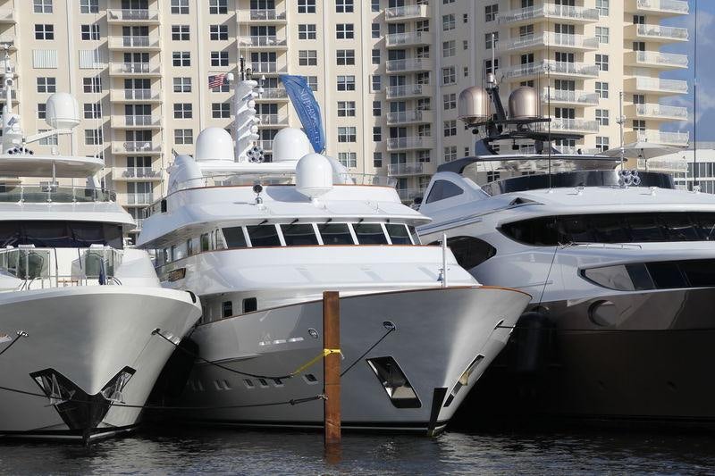 several boats are parked in the water aboard BIG EASY Yacht for Charter