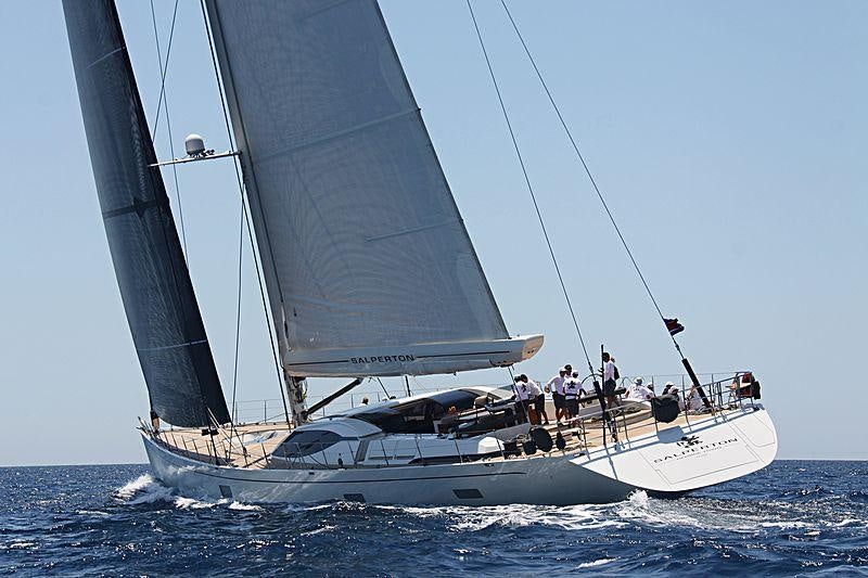 a sailboat with people on it aboard MES AMIS Yacht for Charter