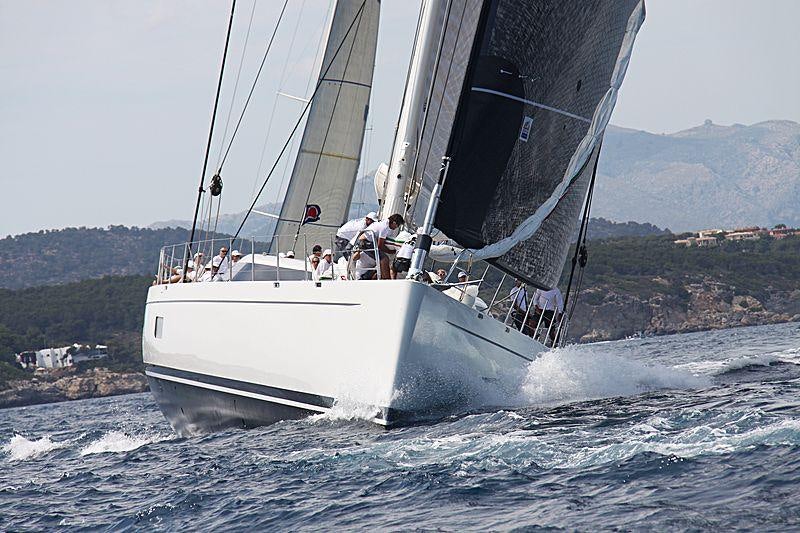 a boat sailing on the water aboard MES AMIS Yacht for Charter