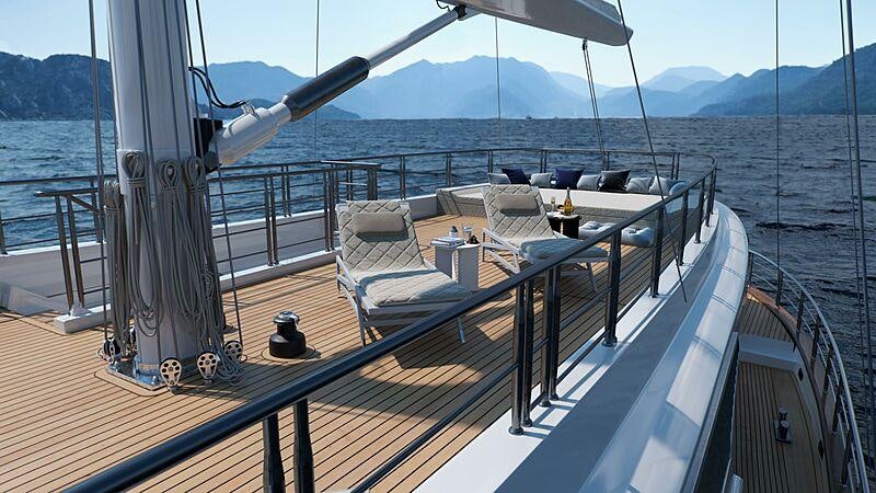 a deck with a view of the ocean and mountains aboard ACAPELLA Yacht for Charter