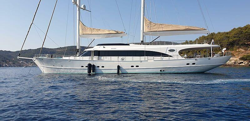a white boat on the water aboard ACAPELLA Yacht for Charter