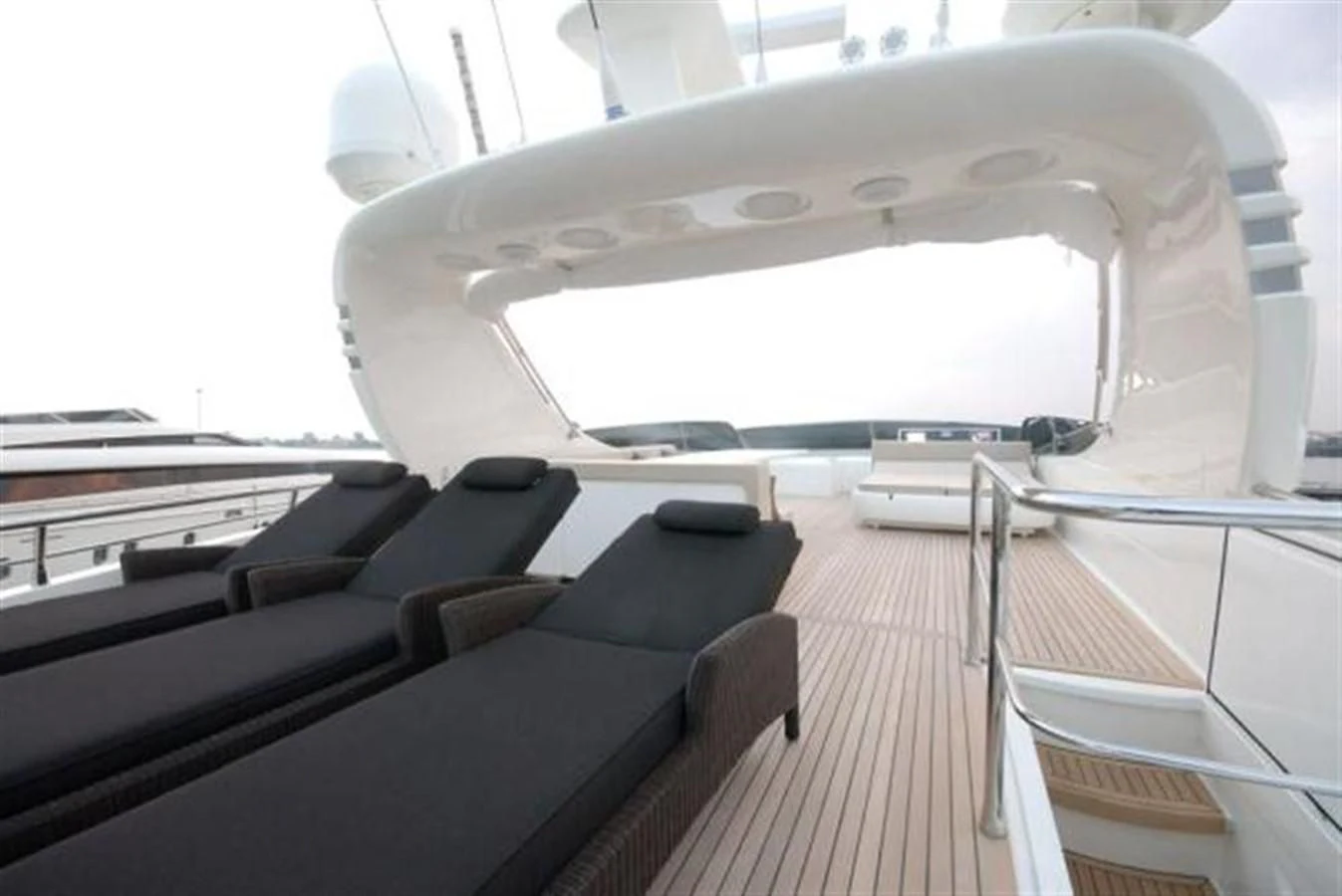 a large white boat in a large room aboard SANS SOUCI Yacht for Sale
