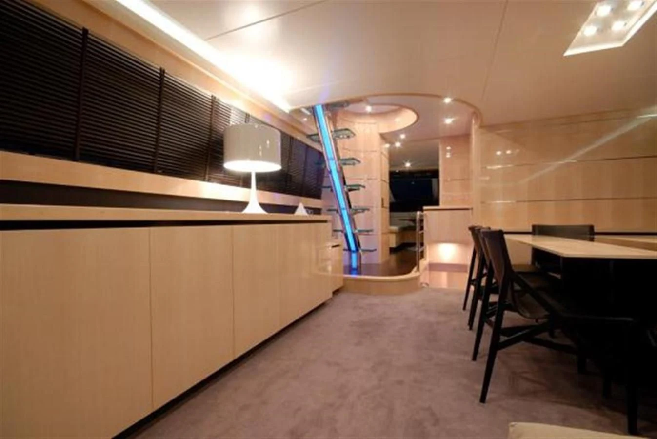 a room with a ladder and chairs aboard SANS SOUCI Yacht for Sale