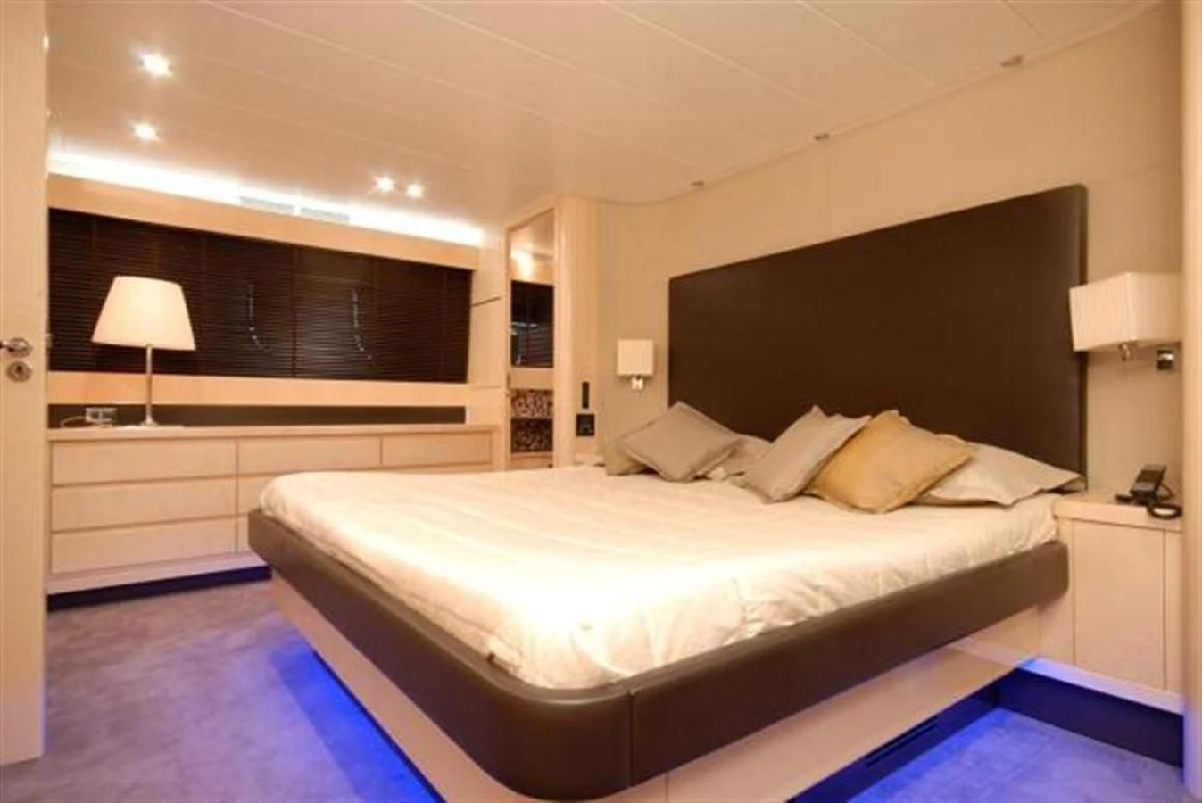 a large bedroom with a bed aboard SANS SOUCI Yacht for Sale