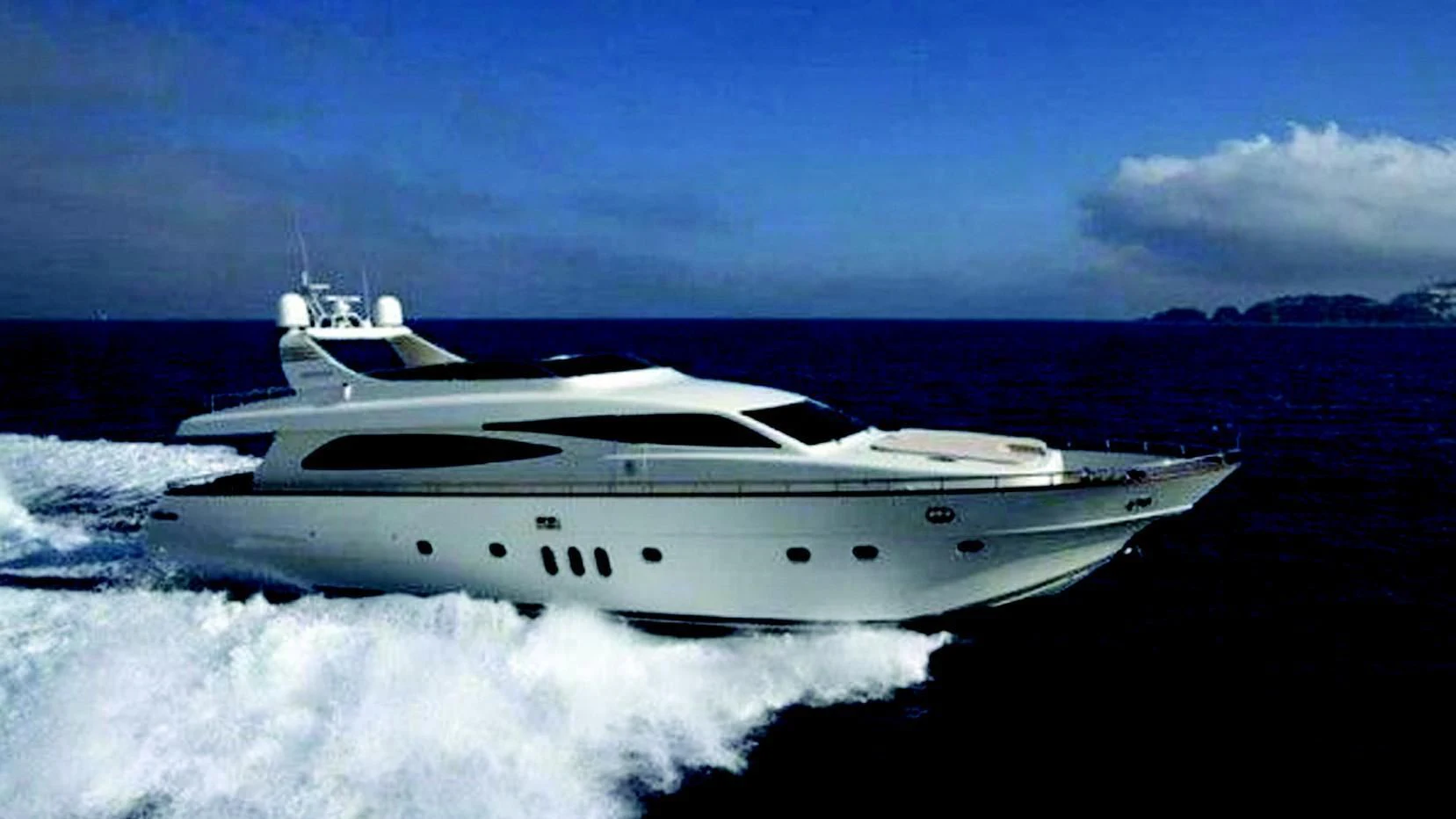a white yacht on a black surface aboard SANS SOUCI Yacht for Sale