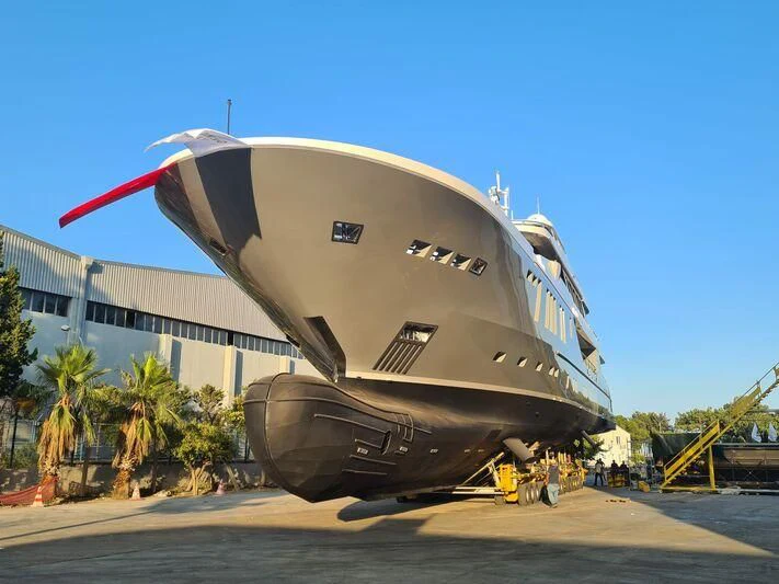 a large airplane on display aboard THANUJA Yacht for Sale