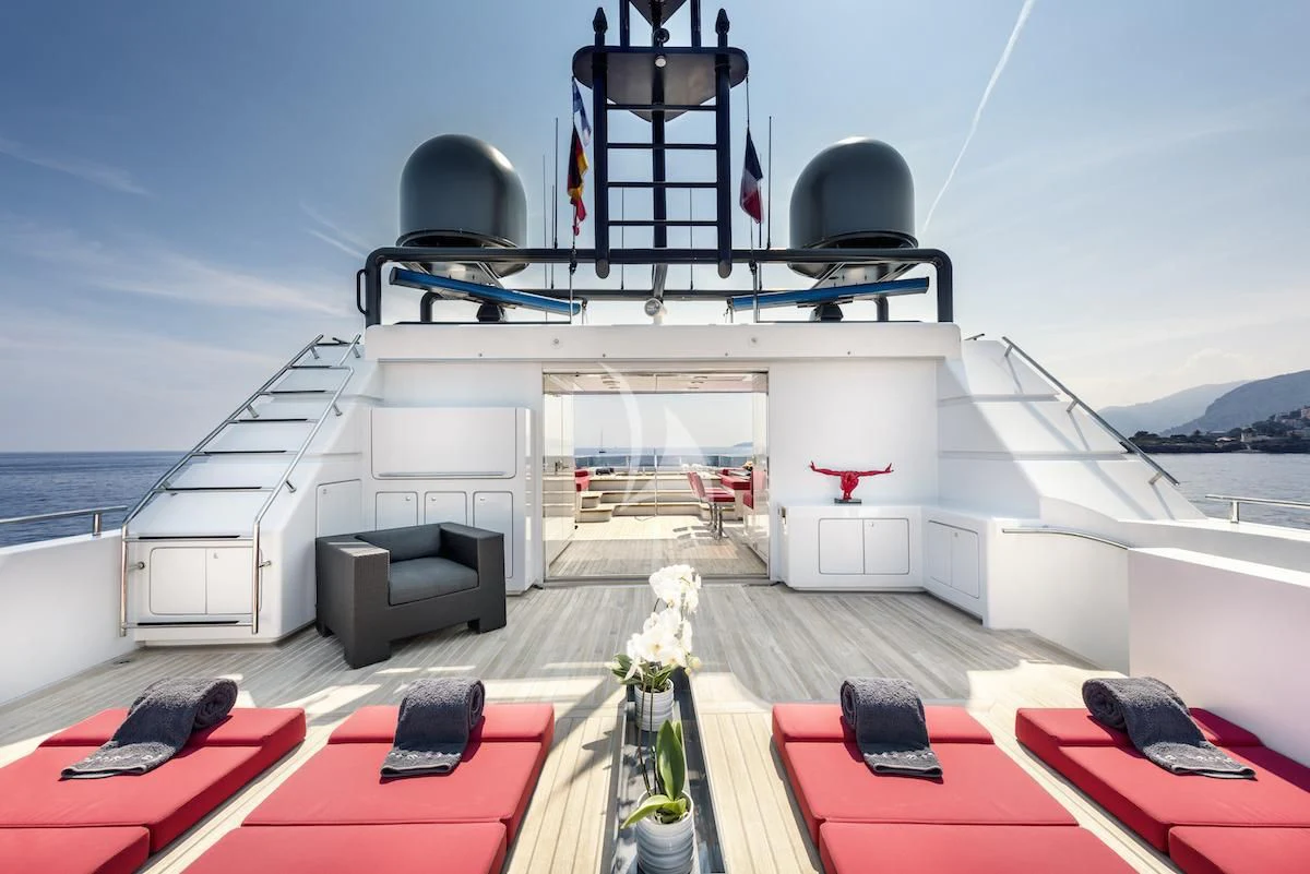 a boat with a statue on it aboard THANUJA Yacht for Sale