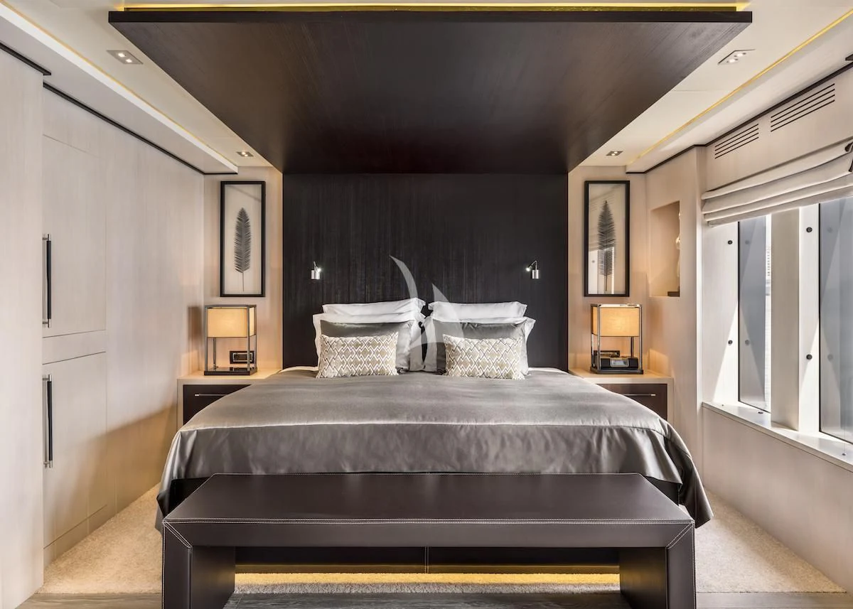 a bed in a room aboard THANUJA Yacht for Sale