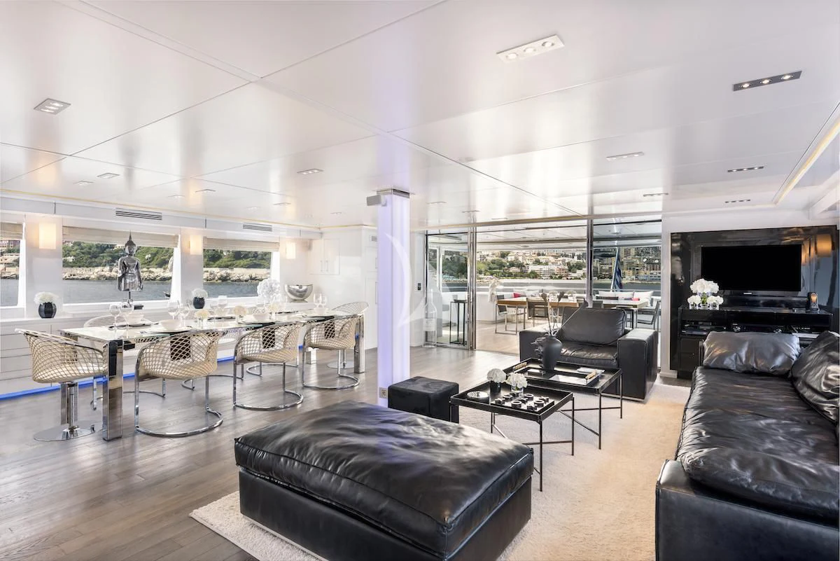 a living room with a large window aboard THANUJA Yacht for Sale
