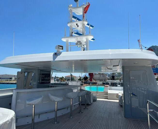 a boat docked at a pier aboard THANUJA Yacht for Sale