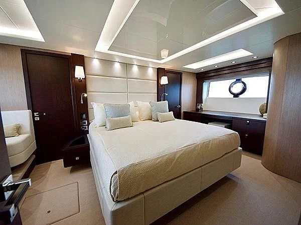 a bed in a room aboard LADY O Yacht for Sale