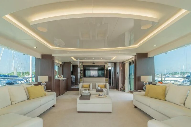 a living room with a large window aboard LADY O Yacht for Sale