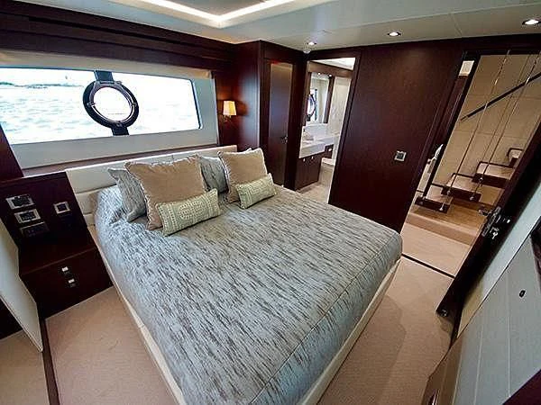 a bed in a room aboard LADY O Yacht for Sale