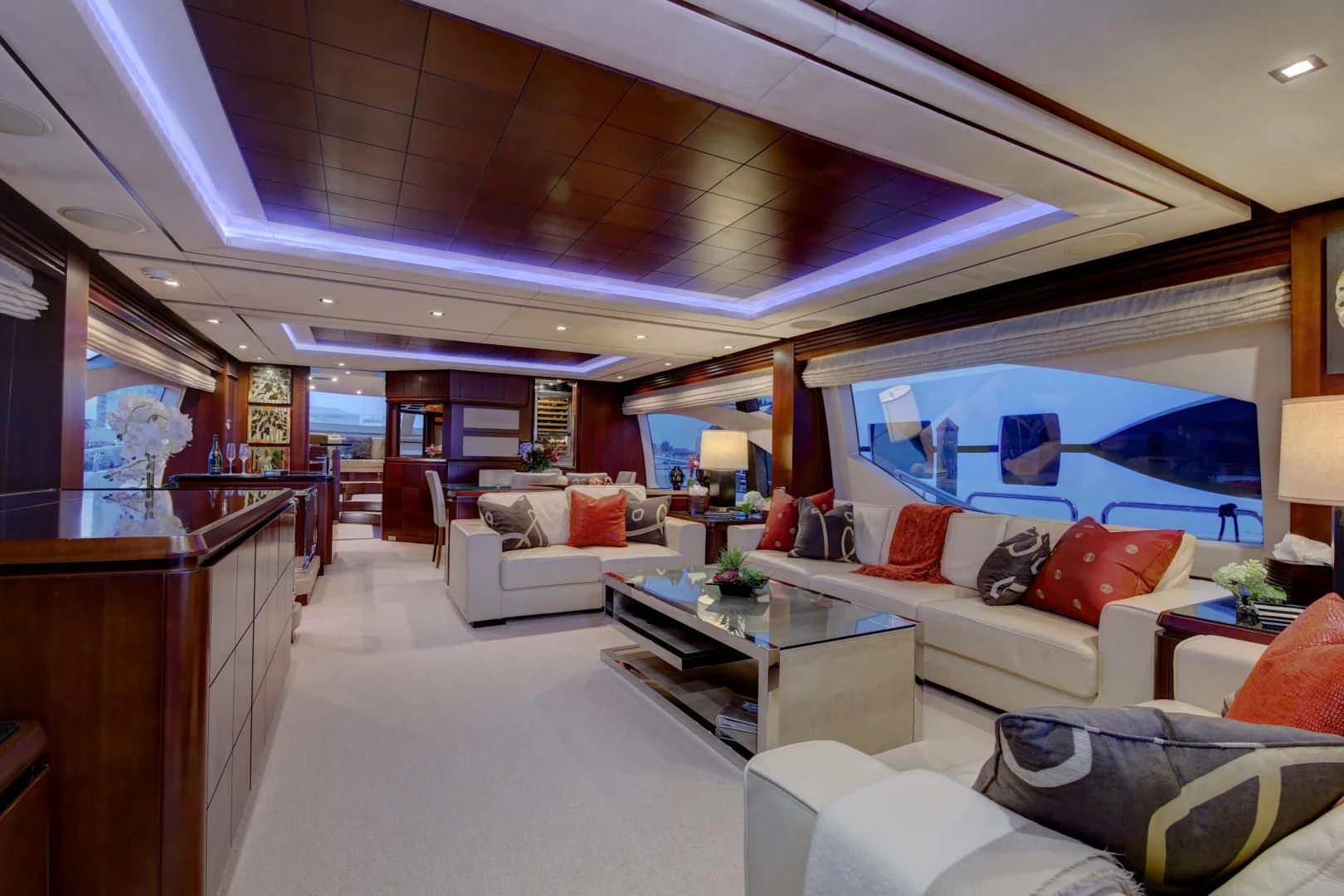 a living room with a large window aboard SORRIDENTE Yacht for Sale