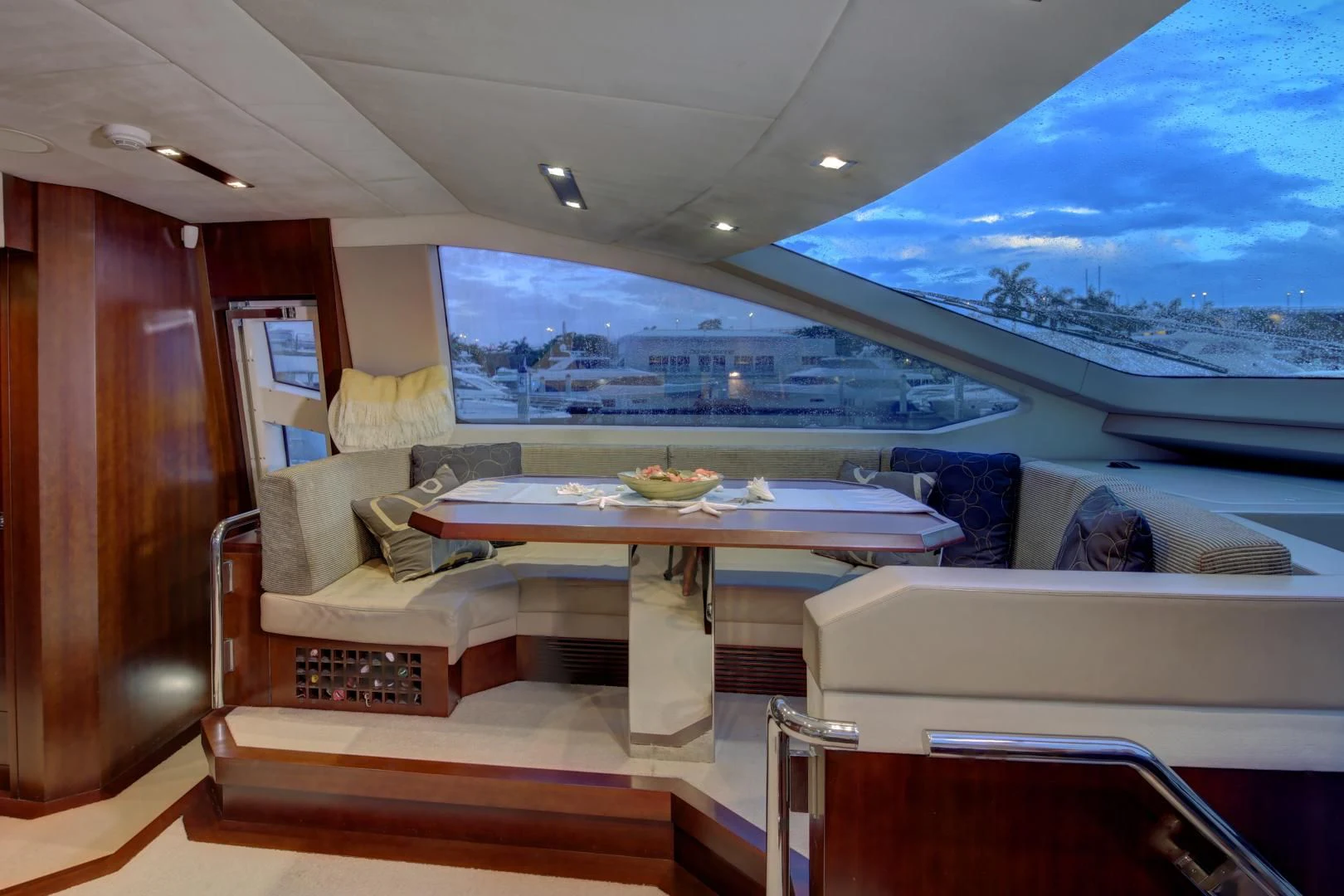 a room with a table and chairs aboard SORRIDENTE Yacht for Sale