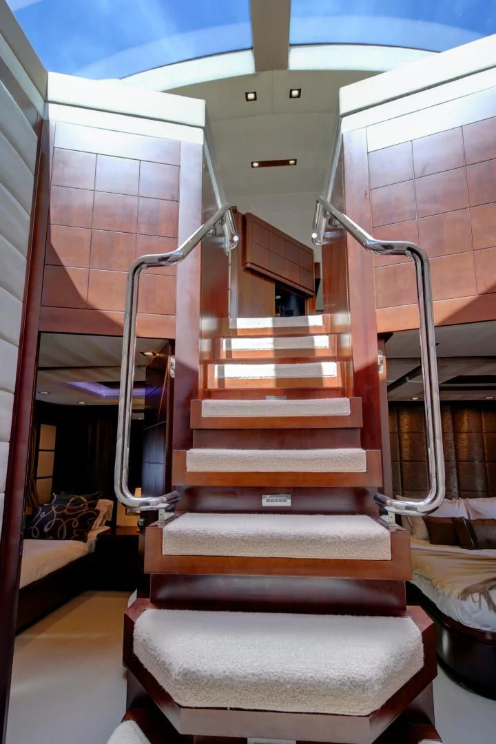 a staircase with a railing aboard SORRIDENTE Yacht for Sale