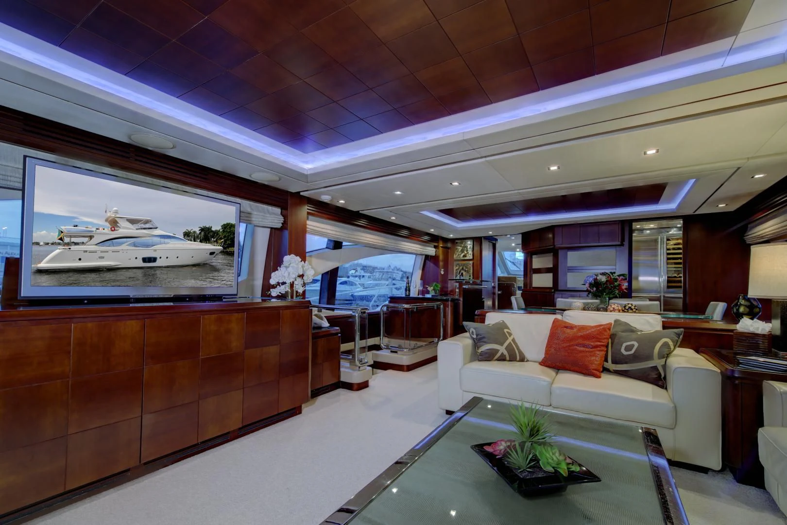 a living room with a large window aboard SORRIDENTE Yacht for Sale