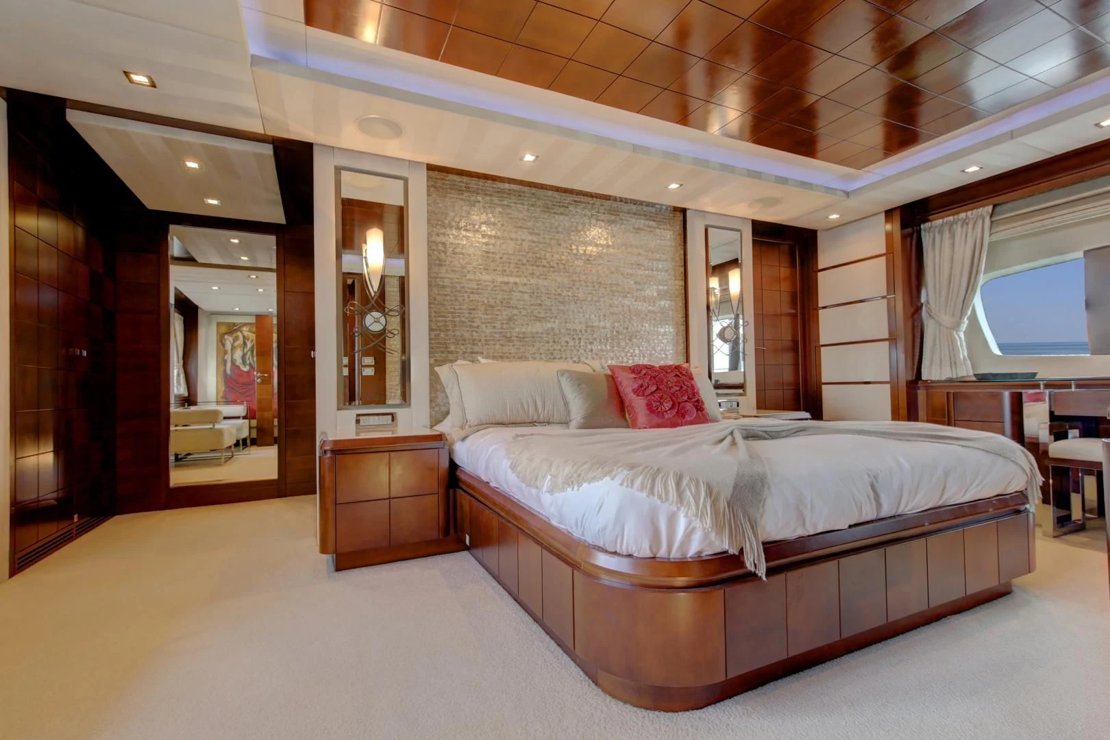a large bed in a room aboard SORRIDENTE Yacht for Sale