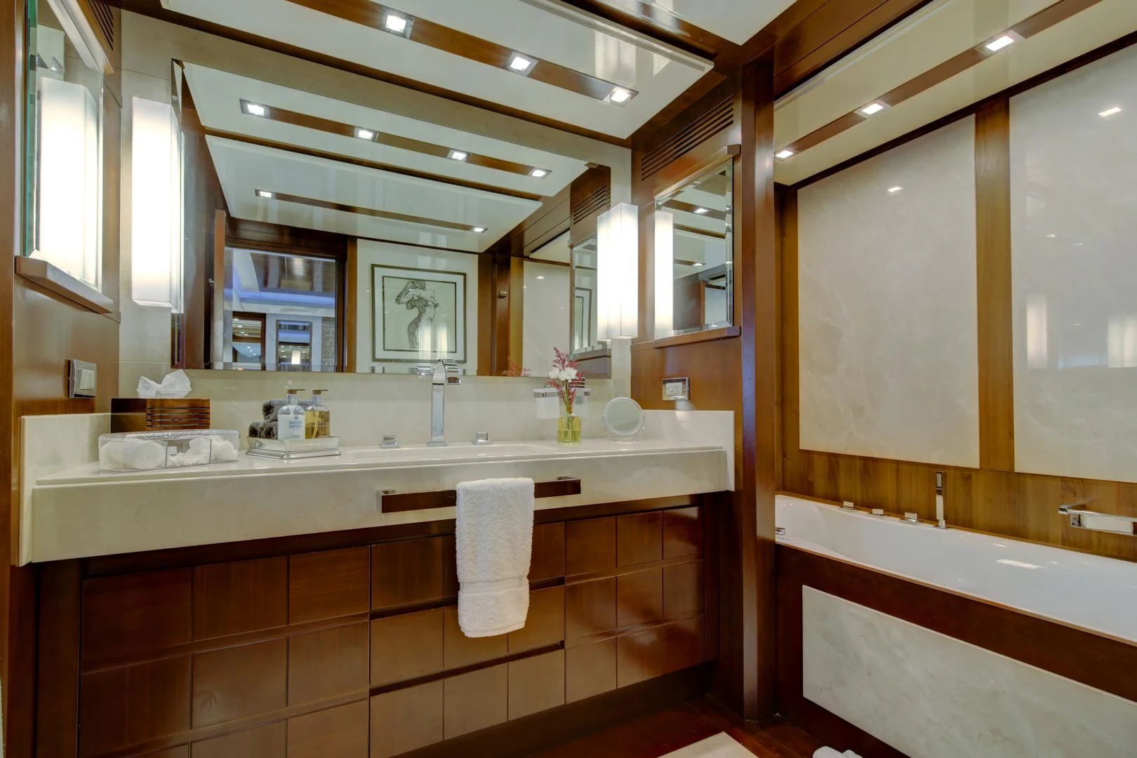 a bathroom with a large mirror aboard SORRIDENTE Yacht for Sale