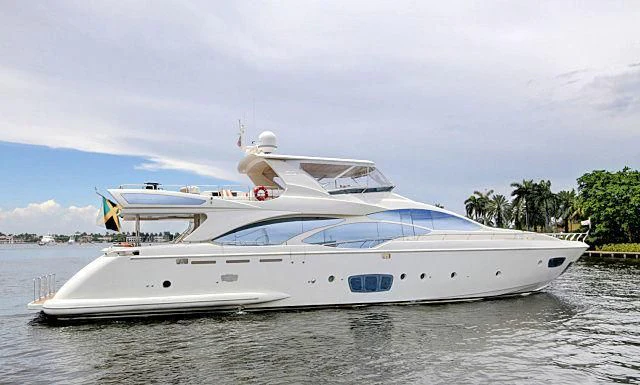 a white yacht on the water aboard SORRIDENTE Yacht for Sale