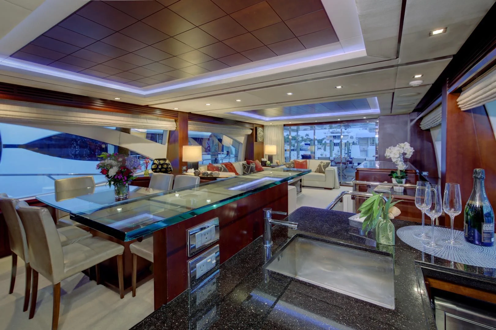 a large kitchen with a bar and a bar aboard SORRIDENTE Yacht for Sale