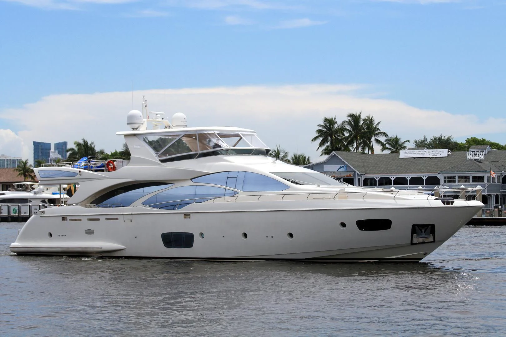 a white yacht in the water aboard SORRIDENTE Yacht for Sale