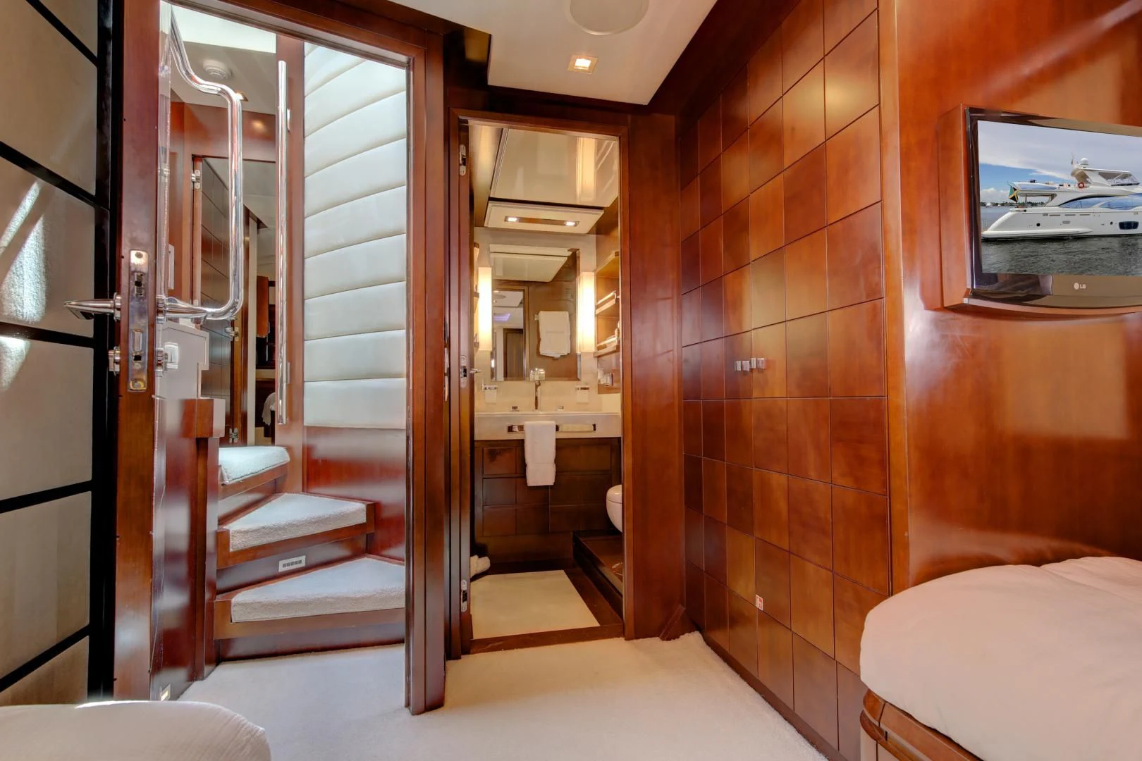 a bathroom with a large mirror aboard SORRIDENTE Yacht for Sale