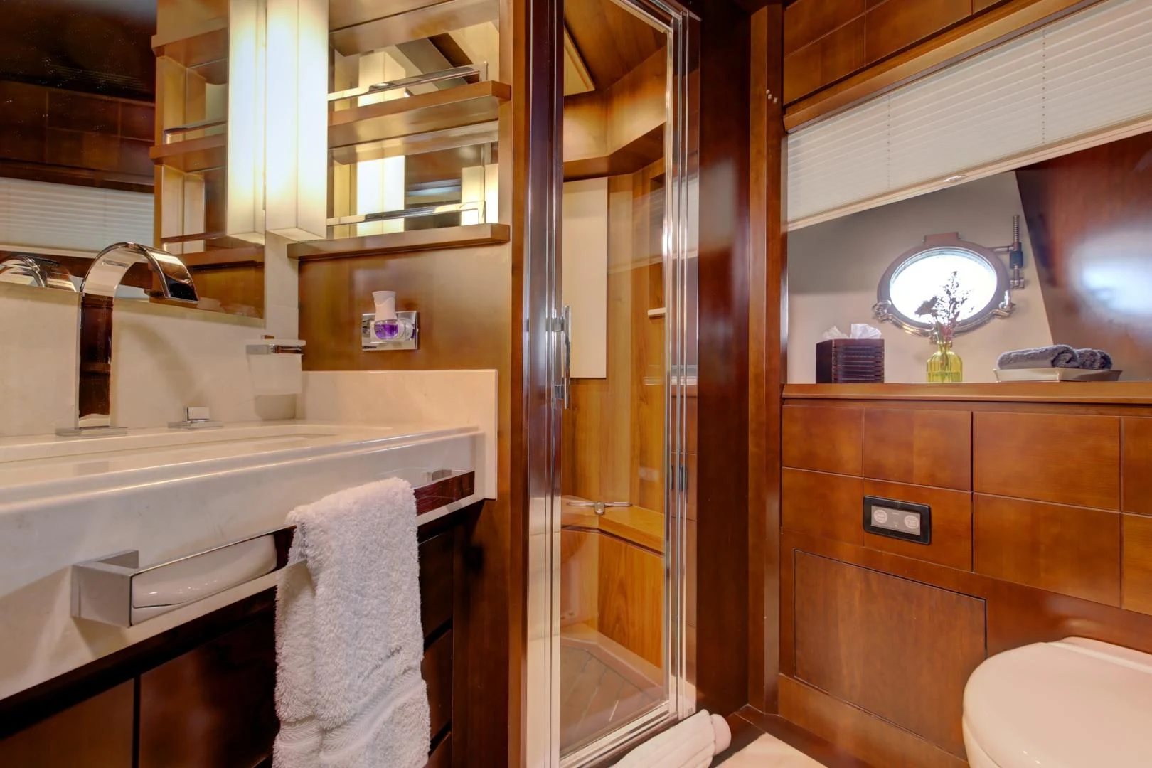 a bathroom with a glass shower aboard SORRIDENTE Yacht for Sale