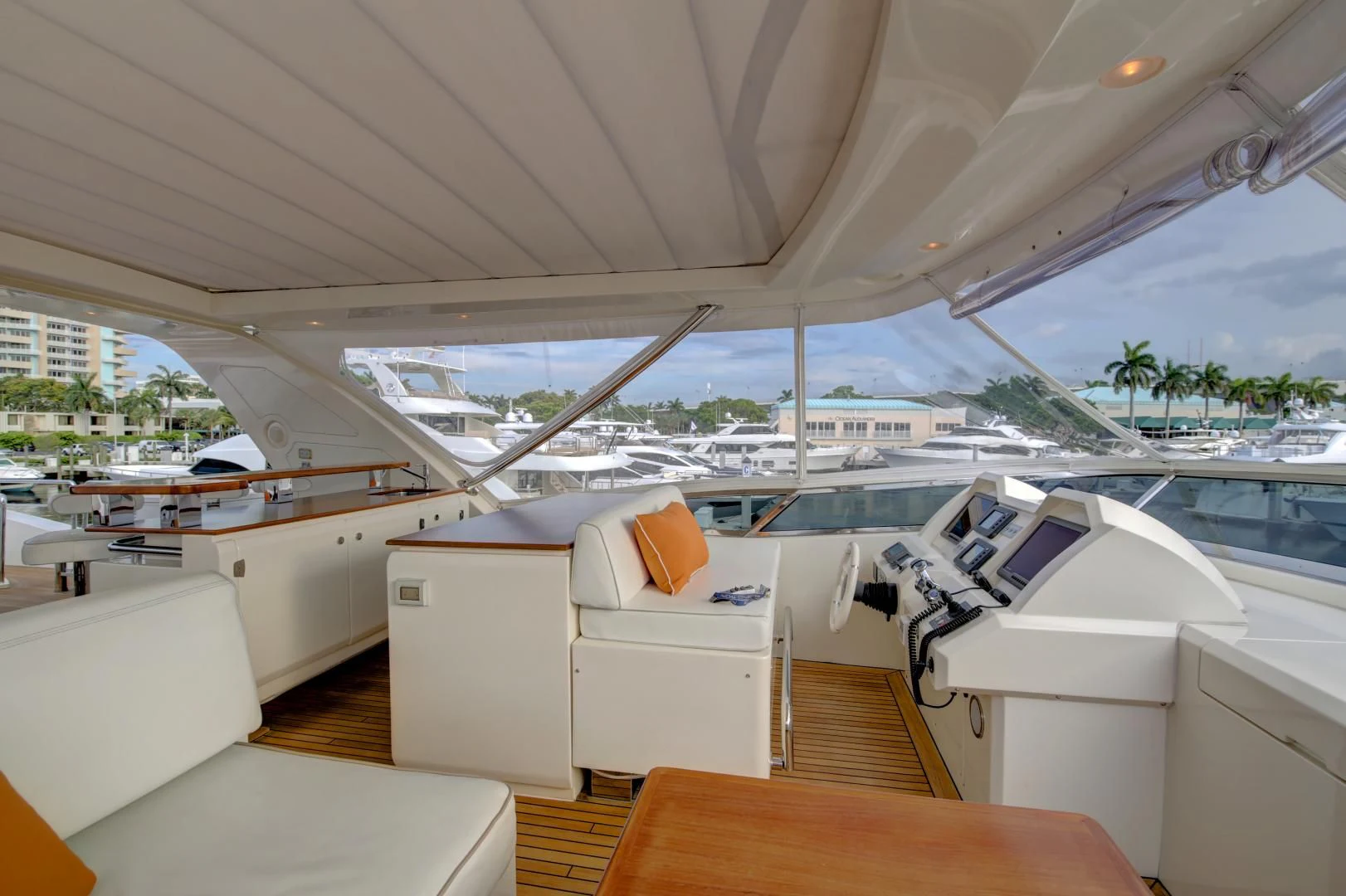 a boat with a deck and a view of the water aboard SORRIDENTE Yacht for Sale