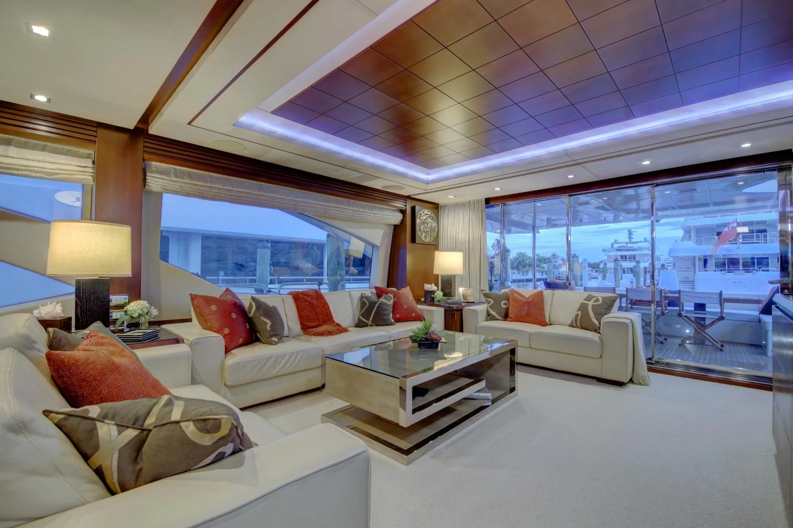 a living room with a large window aboard SORRIDENTE Yacht for Sale