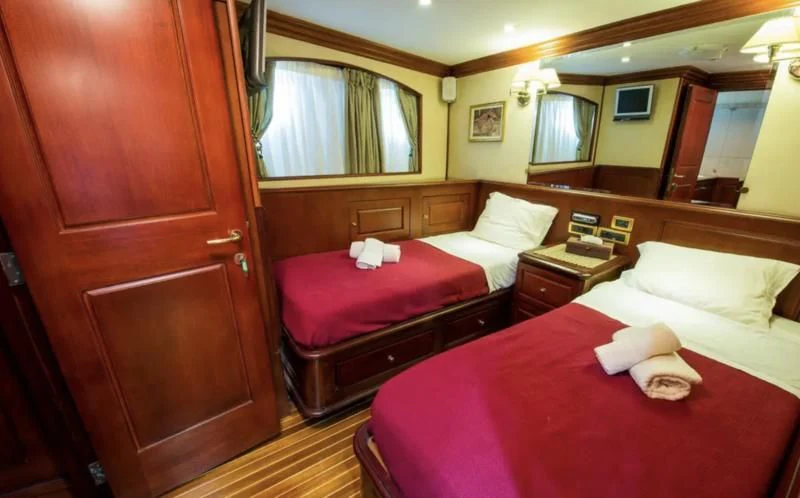 a room with two beds aboard BLUE DREAM Yacht for Sale