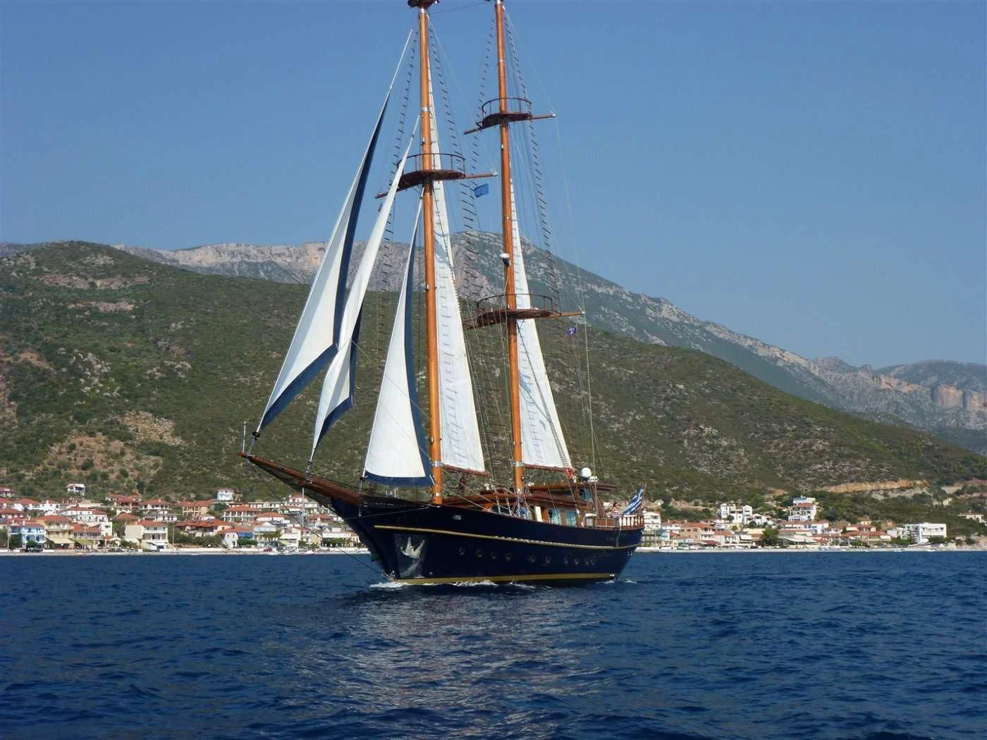 a sailboat on the water aboard BLUE DREAM Yacht for Sale