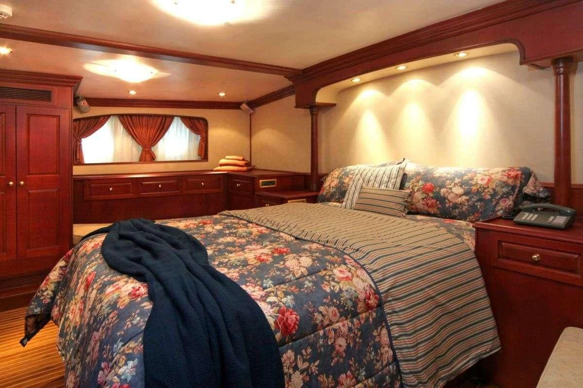 a couple of beds in a hotel room aboard BLUE DREAM Yacht for Sale