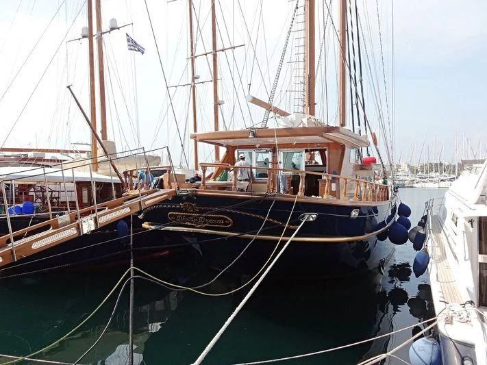 a group of boats are parked in a harbor aboard BLUE DREAM Yacht for Sale
